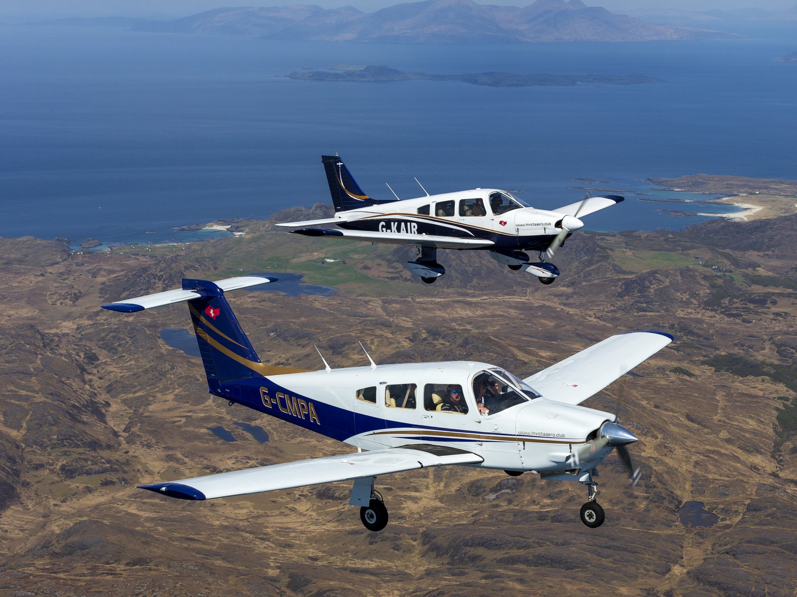 Two Invicta Aero Club Piper PA-28s in formation